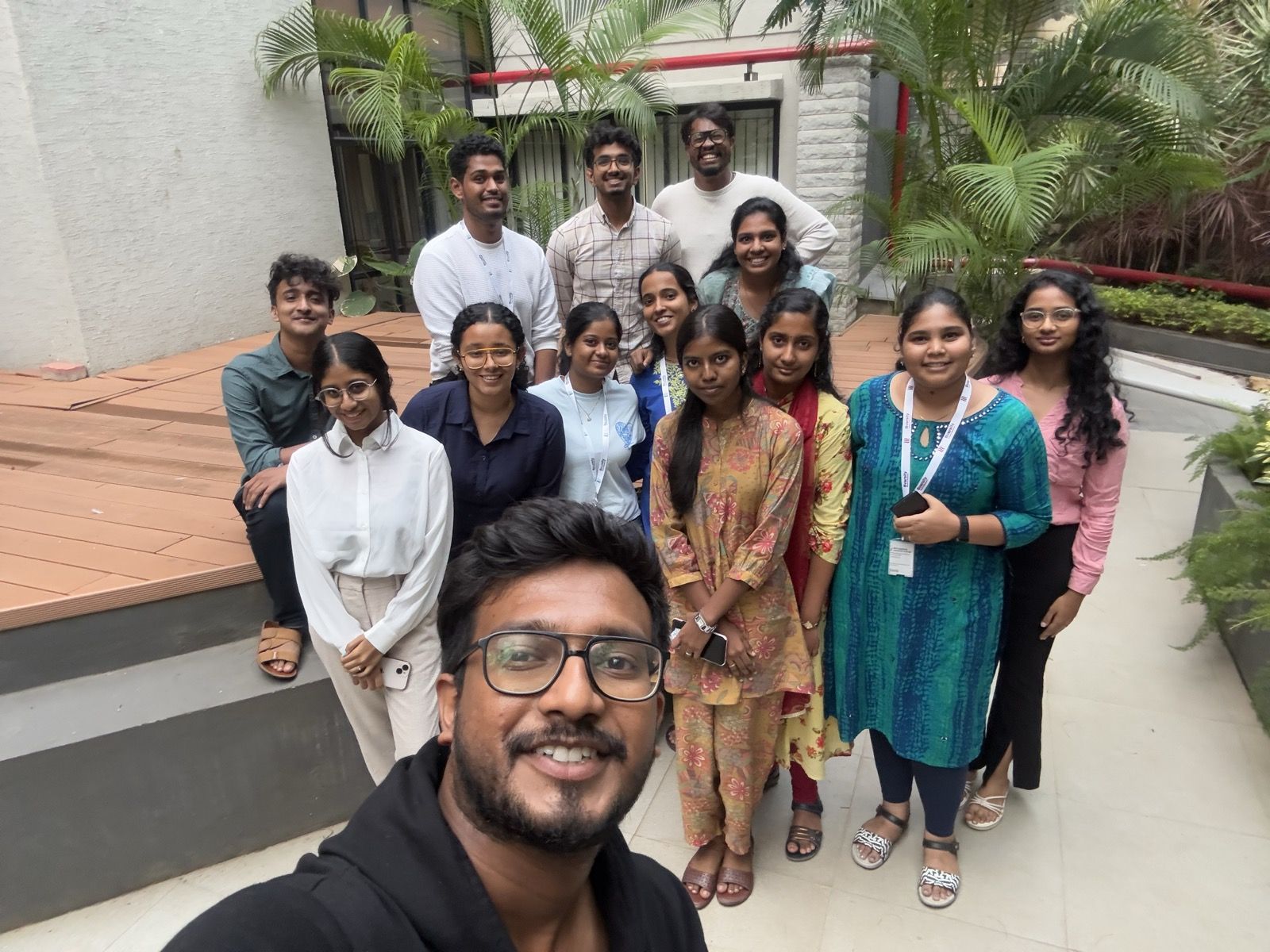 A cohort selfie in the courtyard